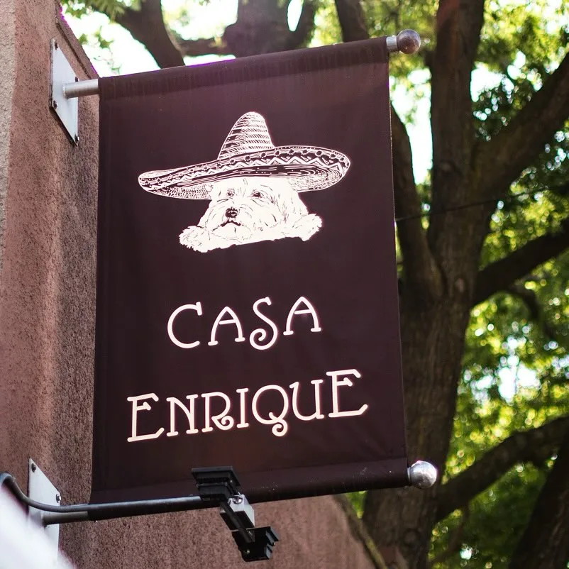 The exterior signage of Casa Enrique, Long Island City