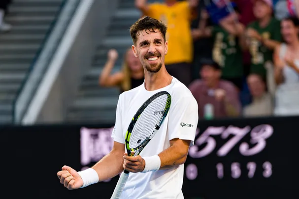 MELBOURNE, AUSTRALIA - JANUARY 13: Thanasi Kokkinakis of Australia celebrates match point in the Men's Singles First Round match against Roman Safiullin during day two of the 2025 Australian Open at Melbourne Park on January 13, 2025 in Melbourne, Australia. (Photo by Andy Cheung/Getty Images)