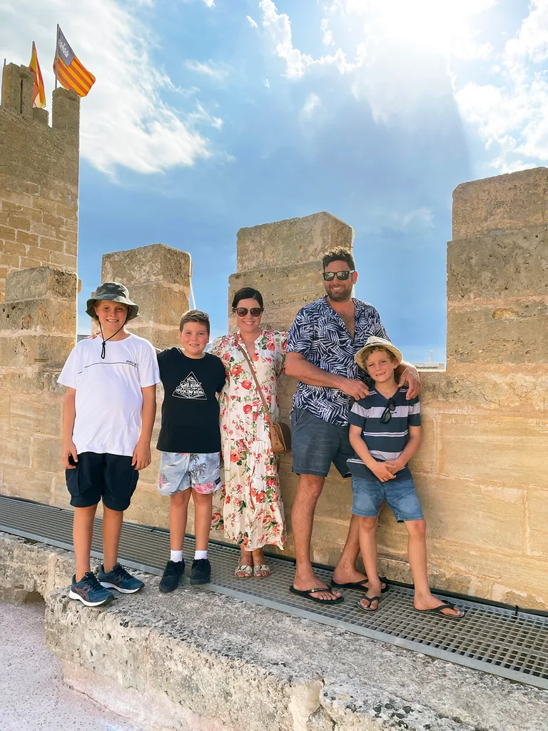 A family of five: Mum, Dad, and three young boys.