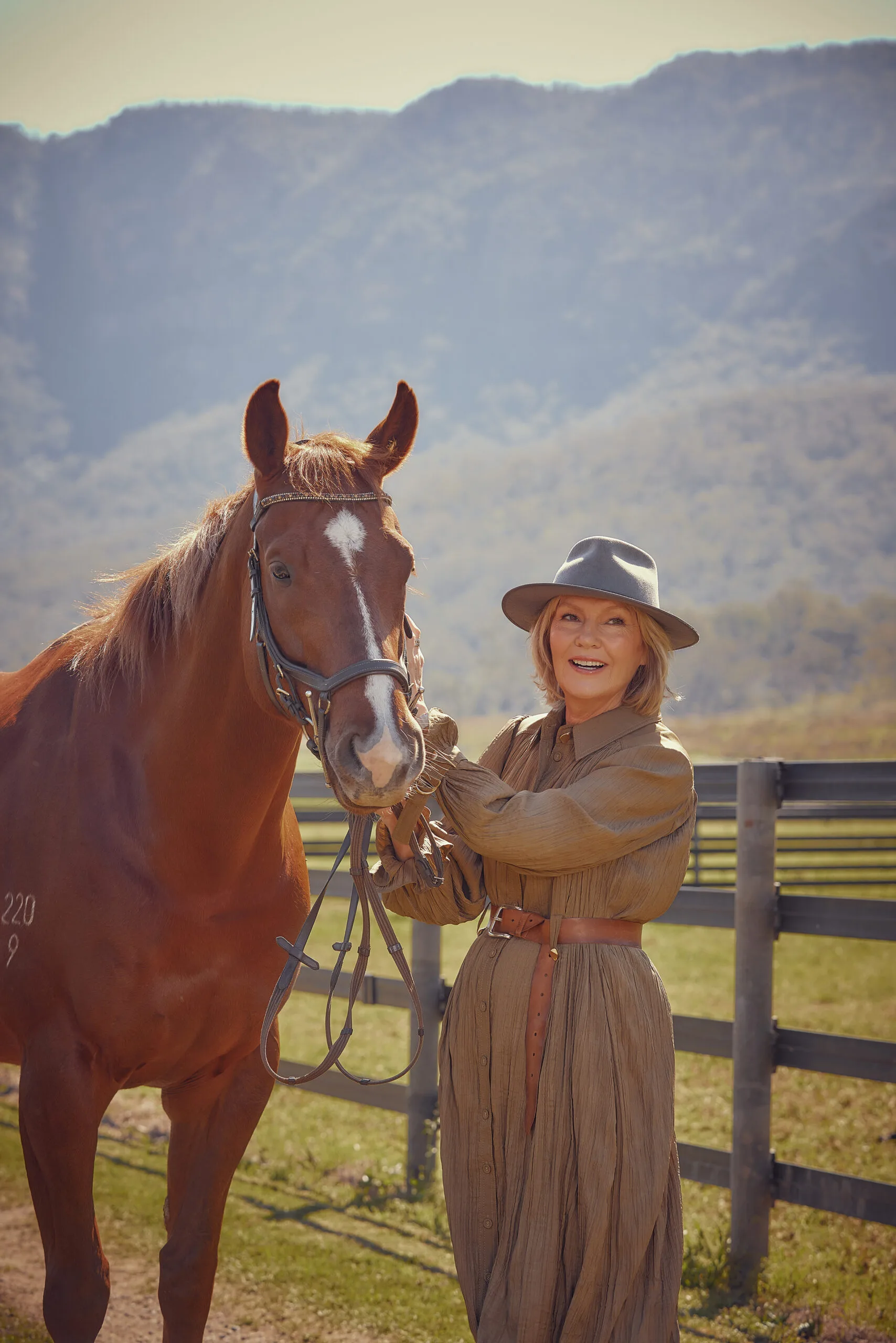 Katie Page, Harvey Norman CEO, with a horse.
