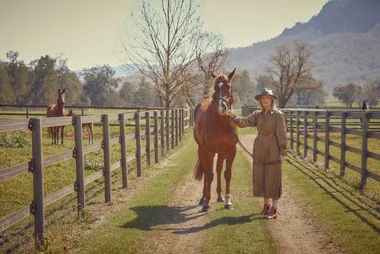 Katie Page, Harvey Norman CEO, with a horse.