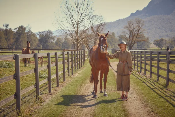 Katie Page, Harvey Norman CEO, with a horse.