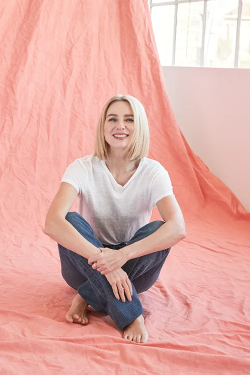 Naomi Watts in a simple white tee and denim jeans on the fashion shoot to talk about menopause