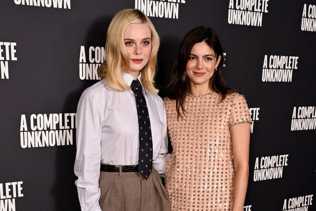 Elle Fanning and Monica Barbaro at a photocall for A Complete Unknown. Elle plays a character based on Bob Dylan's muse Suze Rotolo