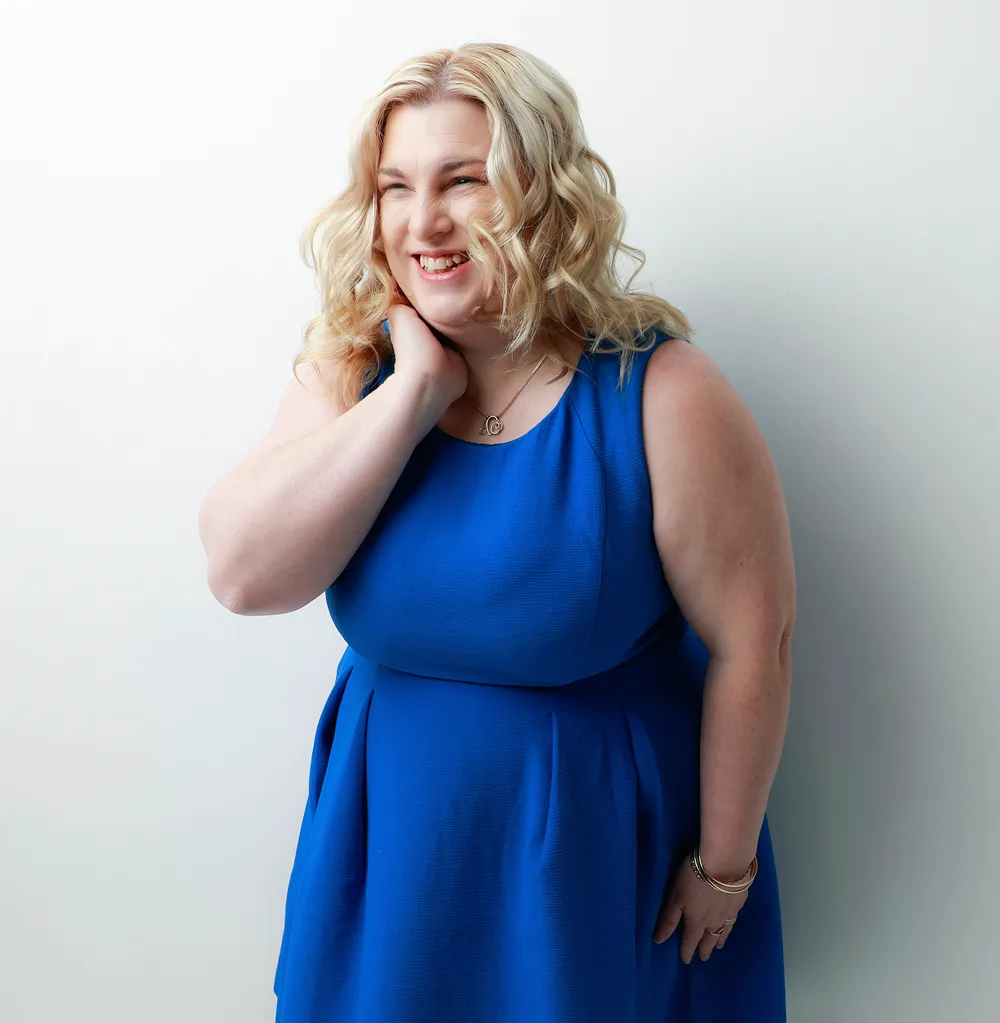 Fiona Newman, a white woman with blonde hair, was born legally blind.