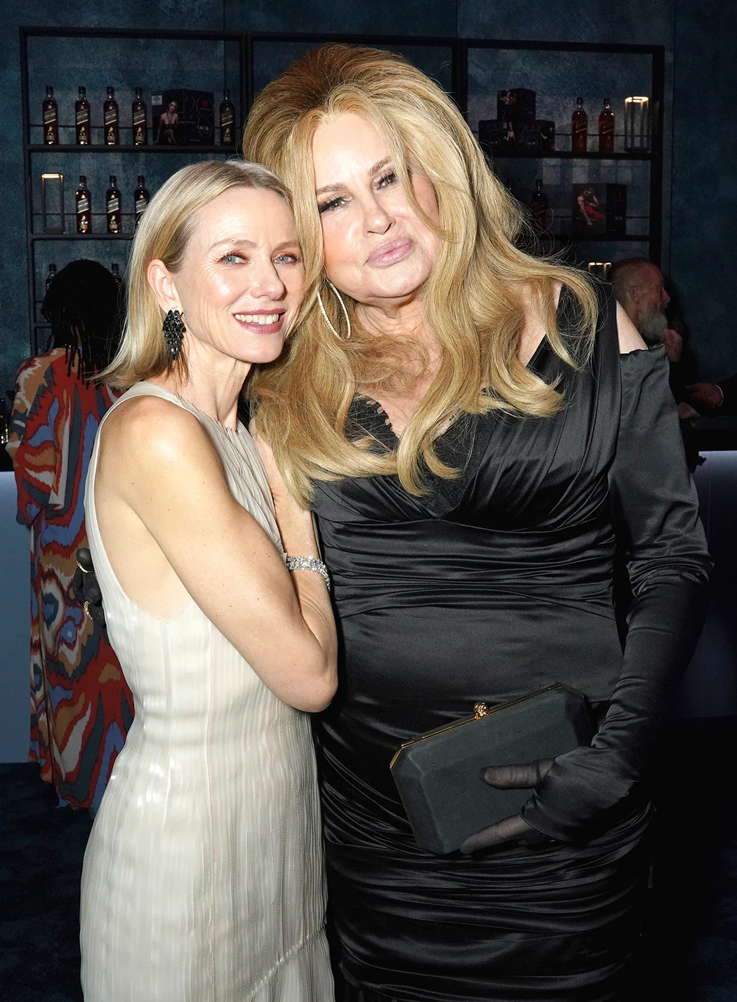 BEVERLY HILLS, CALIFORNIA - MARCH 12: (L-R) Naomi Watts and Jennifer Coolidge attend as Johnnie Walker Celebrates The Vanity Fair Oscar Party at Wallis Annenberg Center for the Performing Arts on March 12, 2023 in Beverly Hills, California.