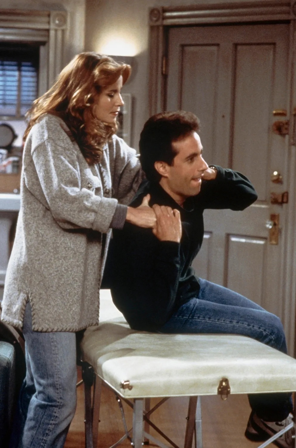 SEINFELD -- "The Masseuse" Episode 9 -- Pictured: (l-r) Jennifer Coolidge as Jody, Jerry Seinfeld as himself (Photo by Jan Sonnenmair/NBCU Photo Bank/NBCUniversal via Getty Images via Getty Images)