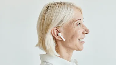 Woman with airpods headphones