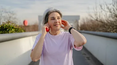 Woman listening to music on a walk