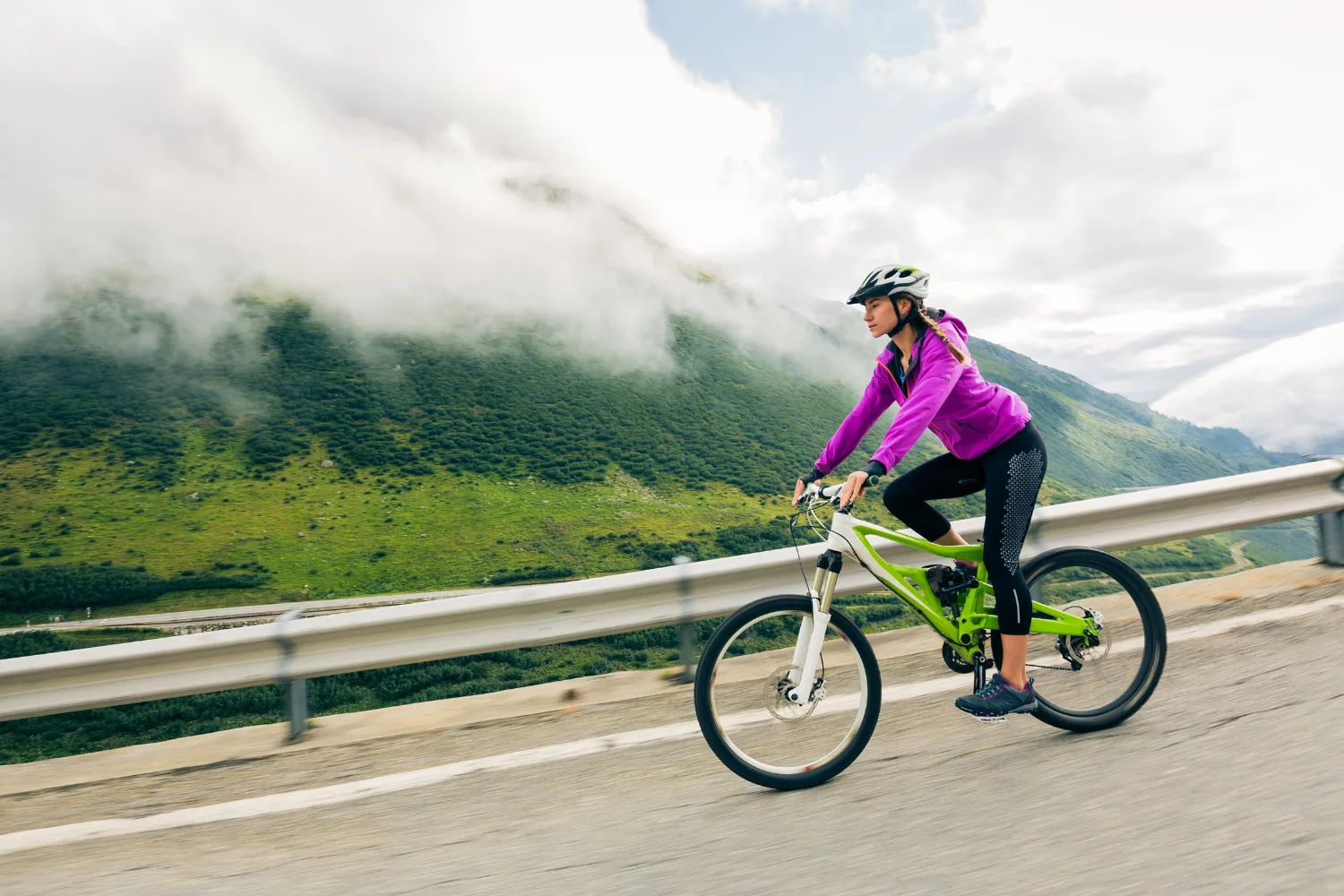 low impact exercises - a woman cycling