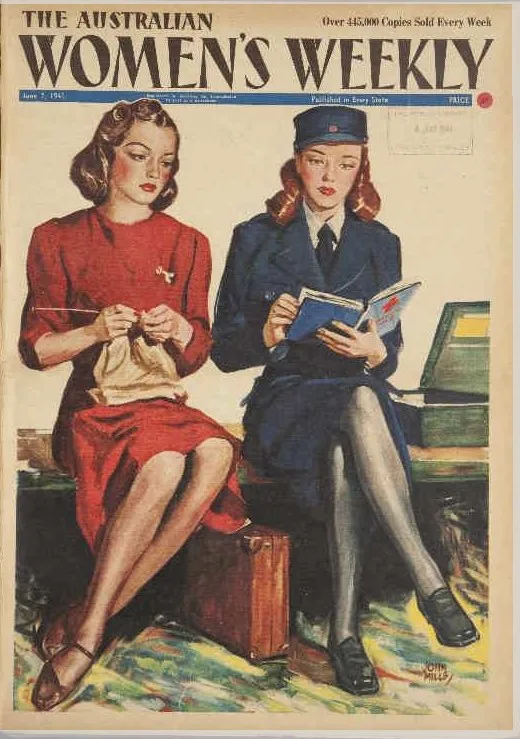 An Australian Women's Weekly cover shows two women sitting on a bench. One is wearing a red dress and knitting. The other, in an army uniform, is reading about first aid.
