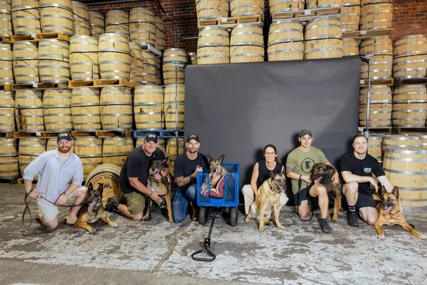 Working Paws Australia at an event at a winery. The charity helps fund veteran dogs who have served Australia