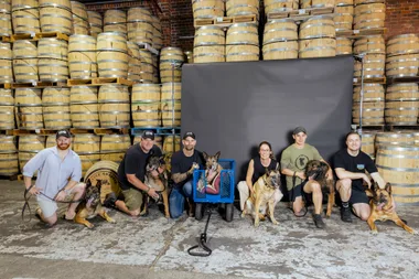 Working Paws Australia at an event at a winery. The charity helps fund veteran dogs who have served Australia