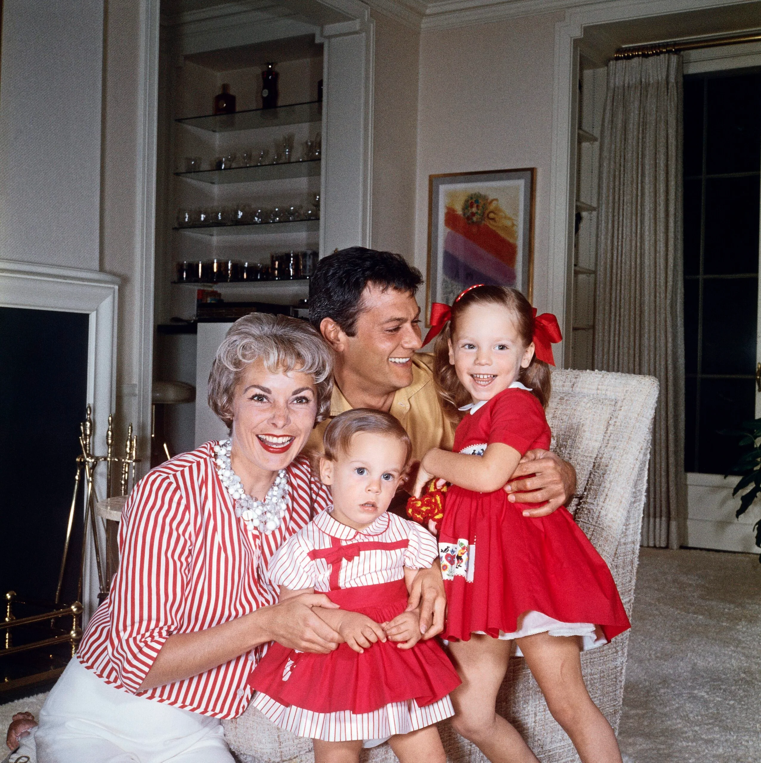 Tony Curtis and Janet Leigh with their two daughters, Jamie Lee and Kelly Lee.