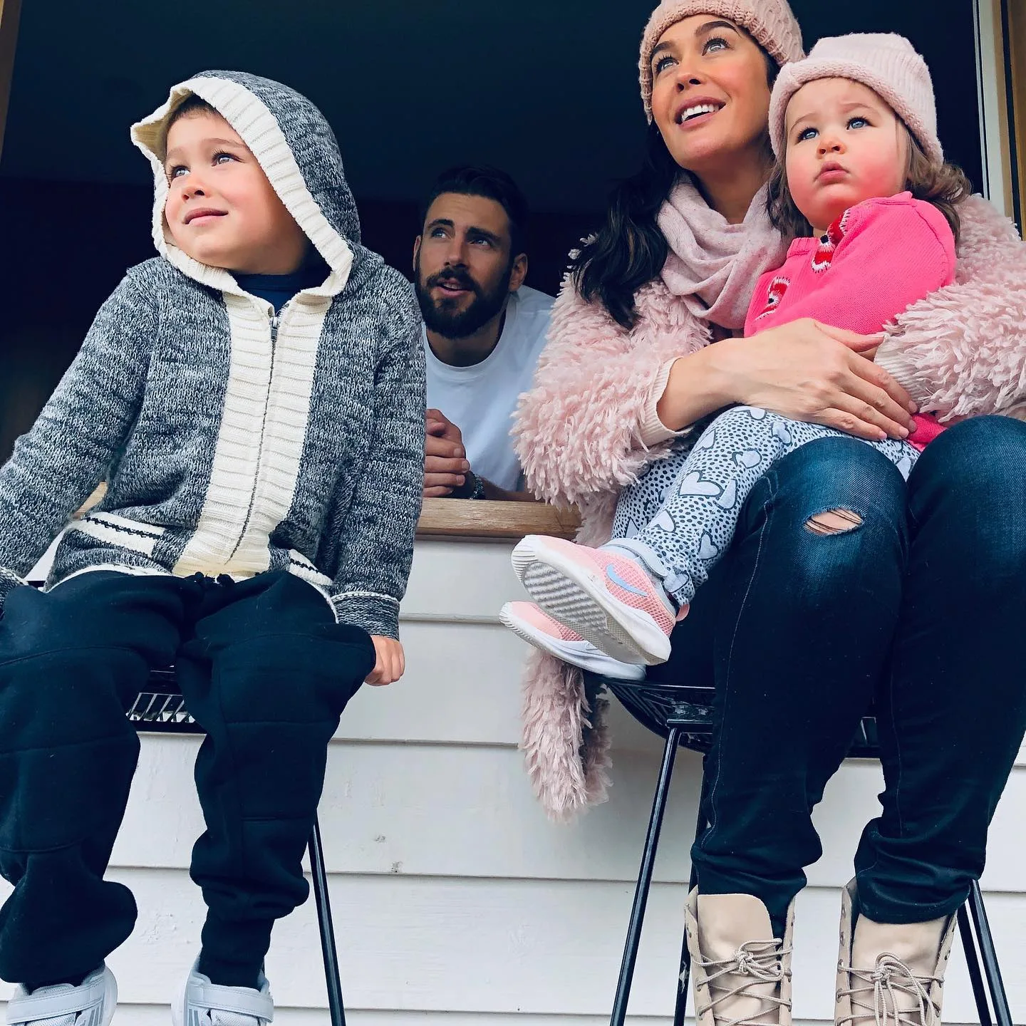 megan gale, her partner and their two kids