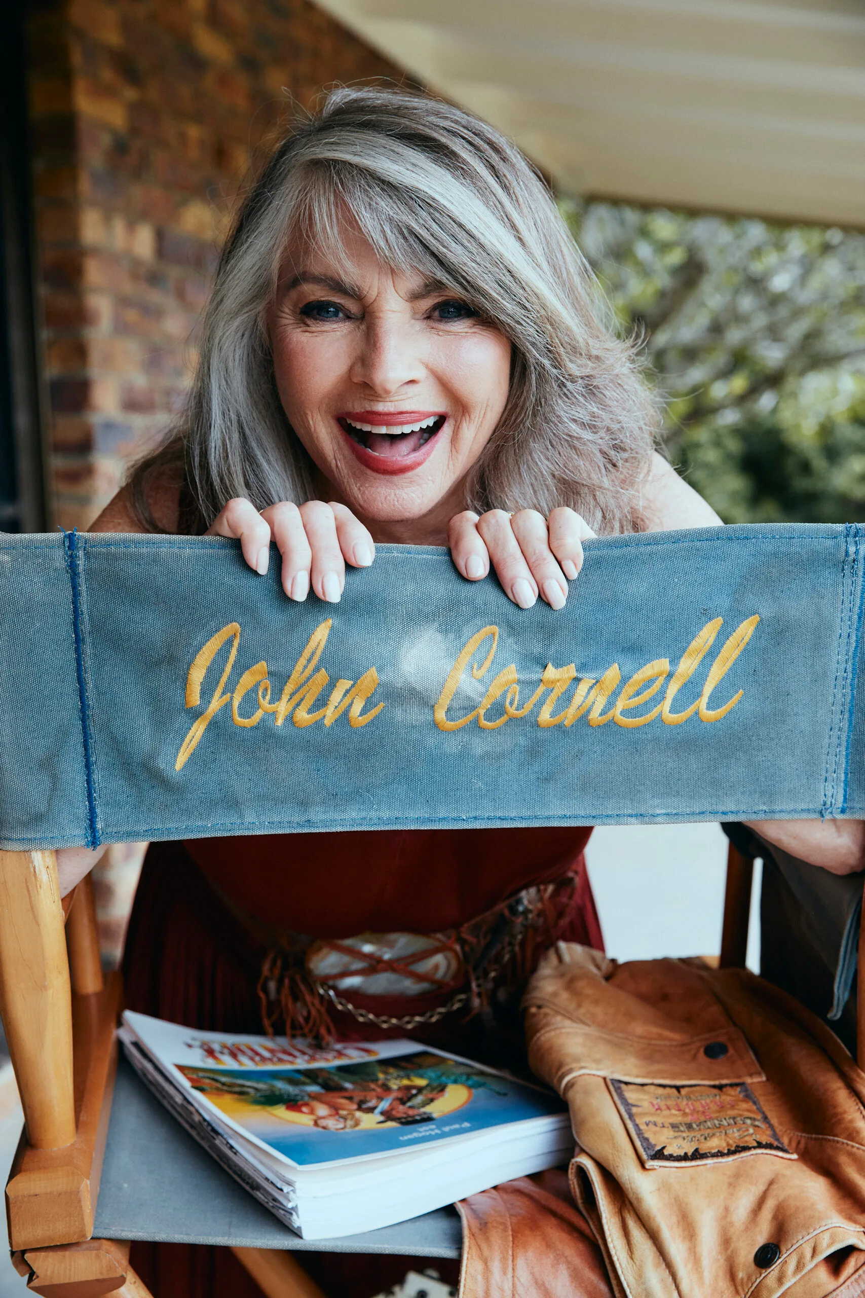 Delvene Delaney with John Cornell's director chair and other Crocodile Dundee memorablia. Photo: Elle Green