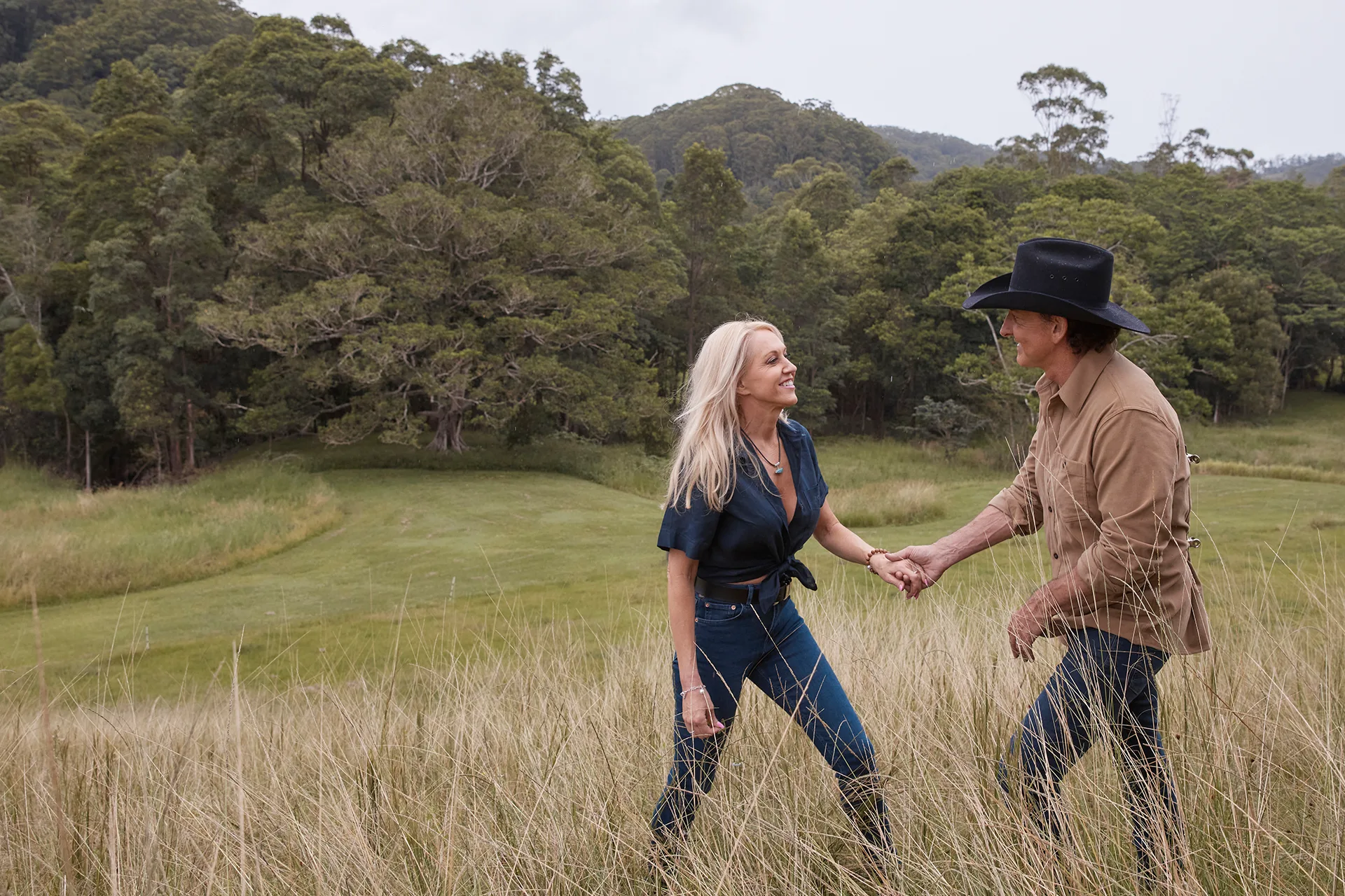 Robby and Lee Kernaghan in a field