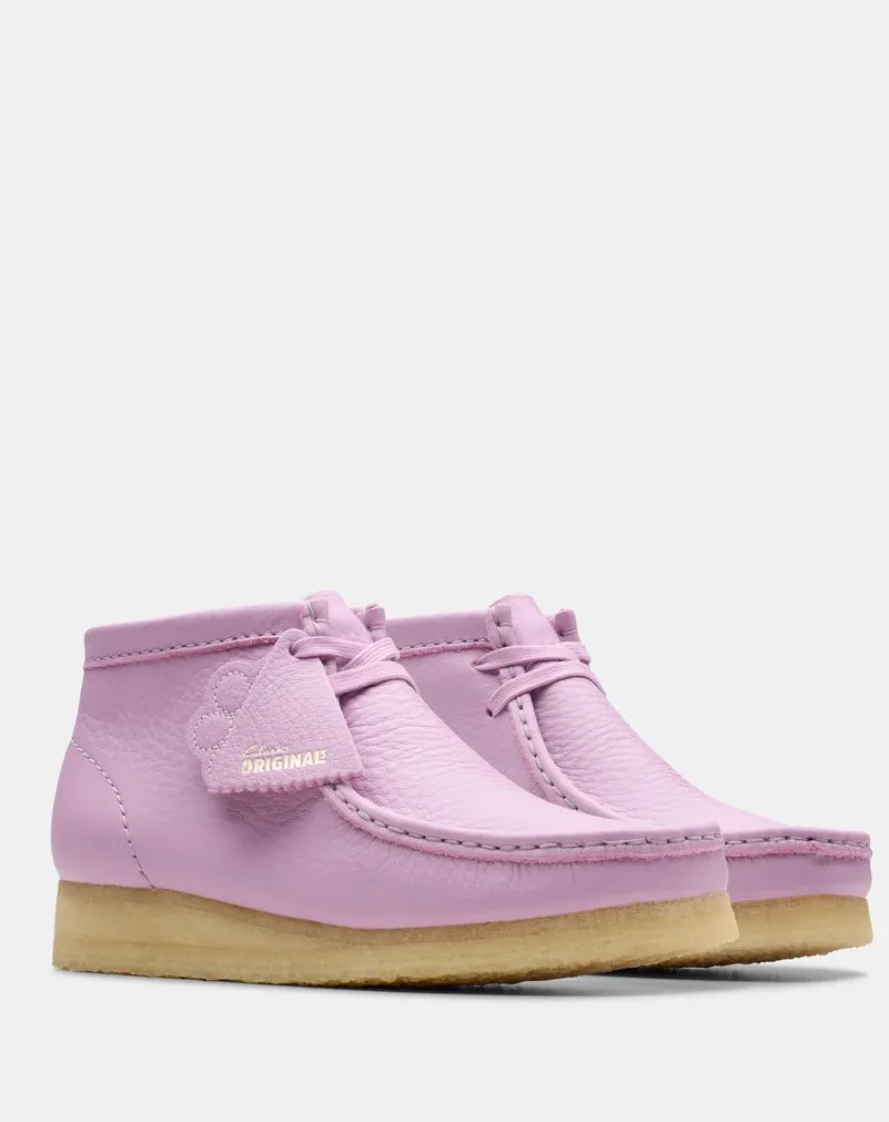 Pair of pale pink leather flat boots by Clarks