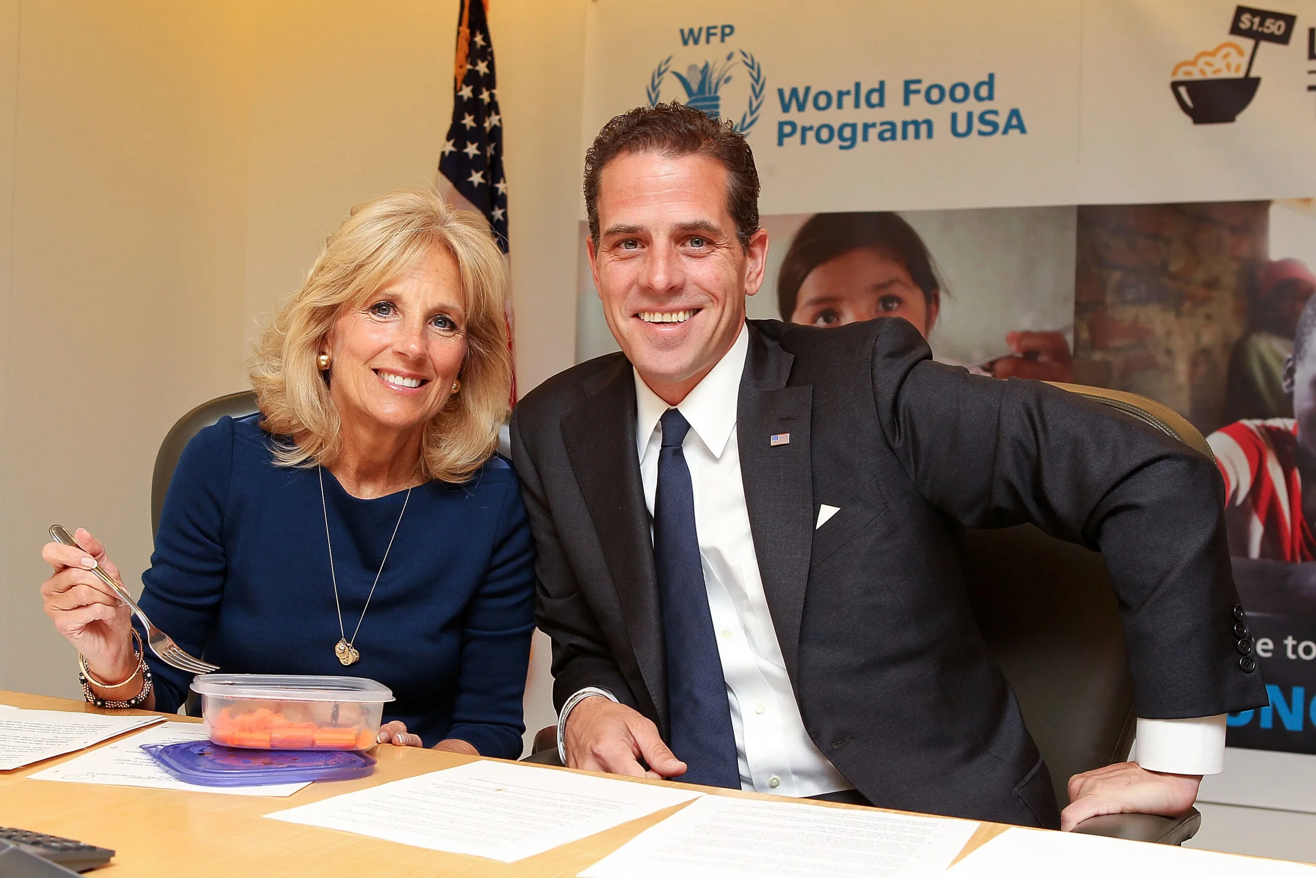
WASHINGTON, DC - MAY 01:  Second Lady Dr. Jill Biden and World Food Program USA Board Chair Hunter Biden taking the Live Below the Line Challenge, eating and drinking on $1.50 a day to raise awareness of global hunger and World Food Programme school feeding efforts around the world, at World Food Program USA on May 1, 2013 in Washington, DC.  (Photo by Paul Morigi/WireImage)