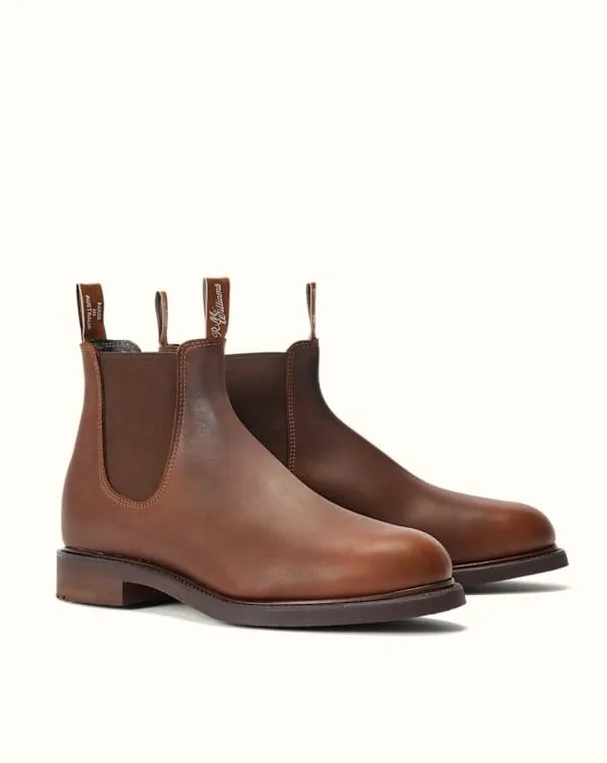 A pair of brown R.M. Williams boots with branded tugs