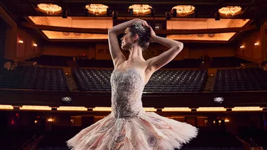 Ballerina on stage in The Nutcracker costume