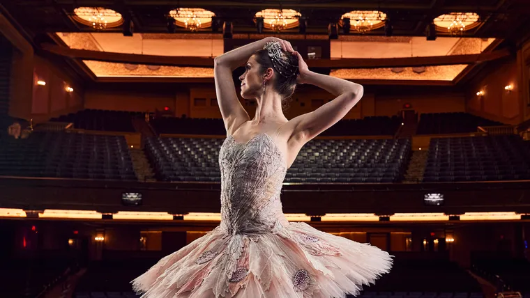 Ballerina on stage in The Nutcracker costume