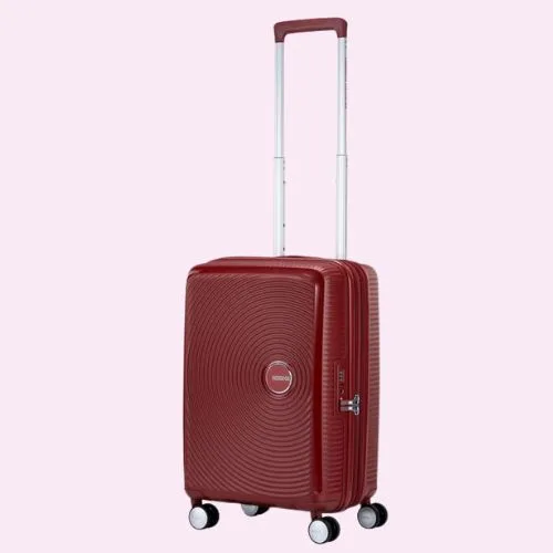 American Tourister Curio 2 suitcase in Dahlia colour