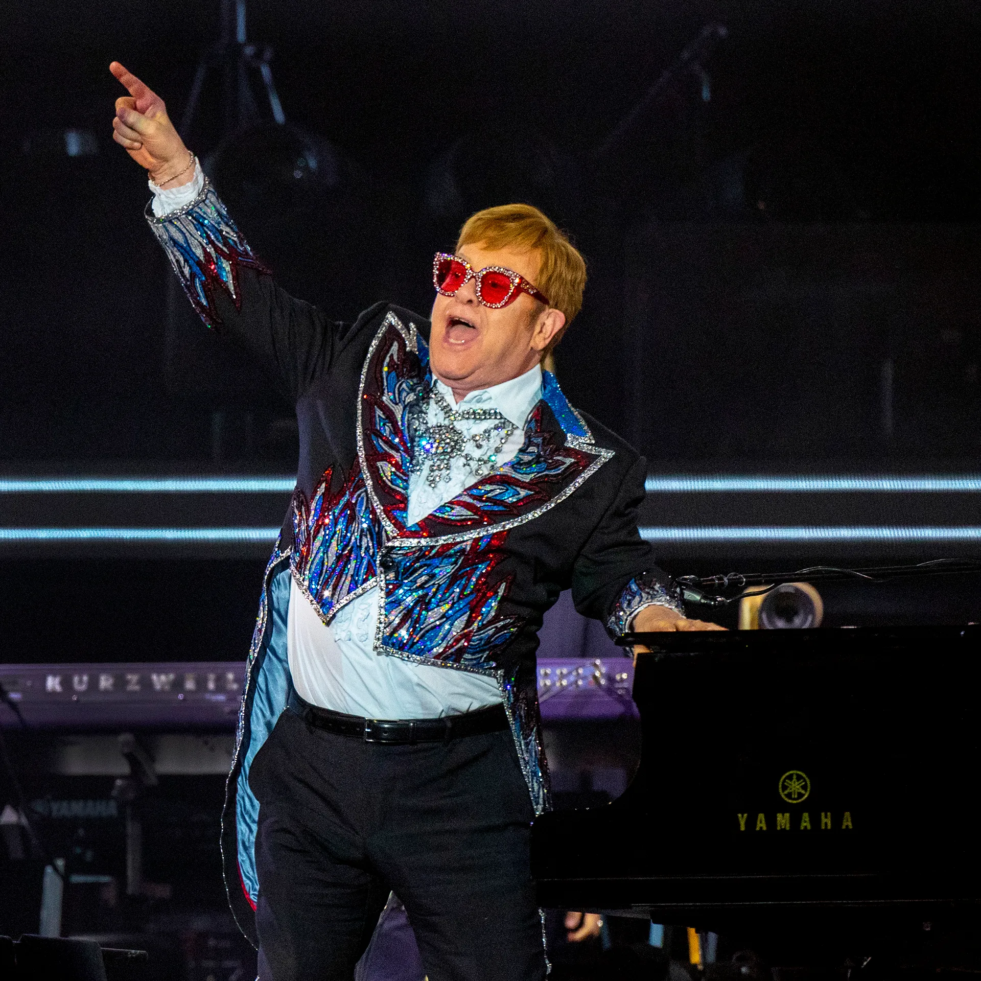 Elton in concert for his Farewell Tour in 2022. (Brian van der Brug / Los Angeles Times via Getty Images)