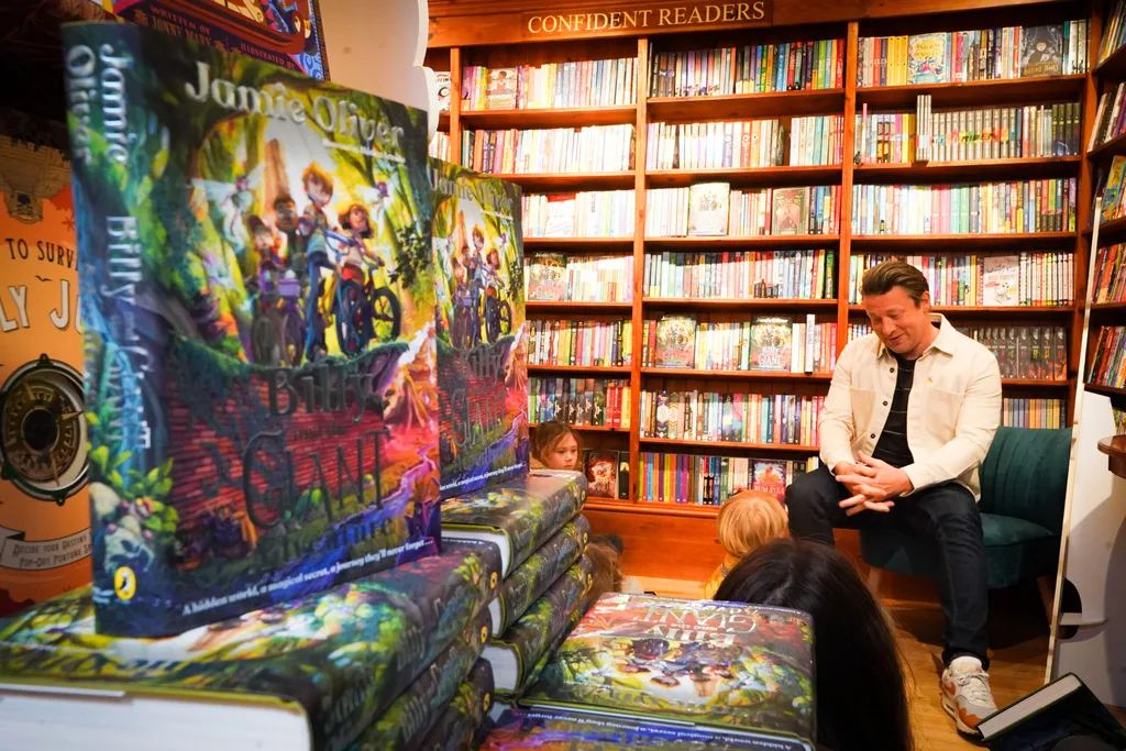 Jamie Oliver answers questions from children at his local independent bookshop, Harts in Saffron Walden, Essex, to promote his book Billy and the Giant Adventure.