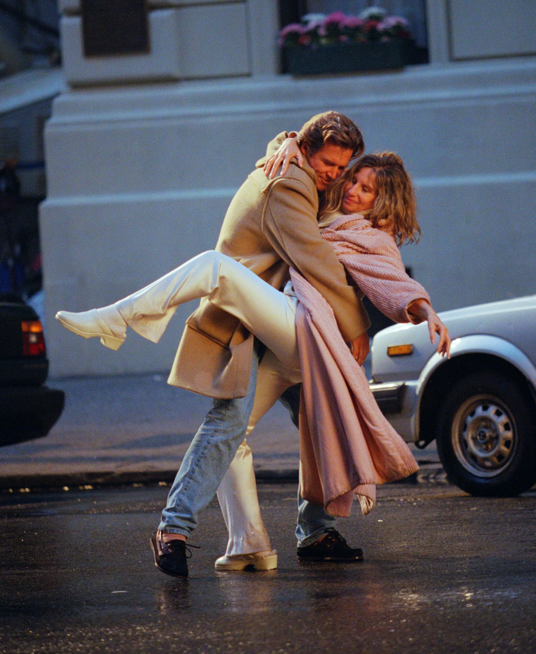 Barbara Streisand and Jeff Bridges dance in the street of New York while filming, "The Mirror Has Two Faces." Streisand told INStyle magazine that this photo was one of the ten best of her ever. It was used inside the CD for the soundtrack. It took place at 6 AM on West End Avenue on May 4, 1996.. (Photo by Lawrence Schwartzwald/Sygma via Getty Images)