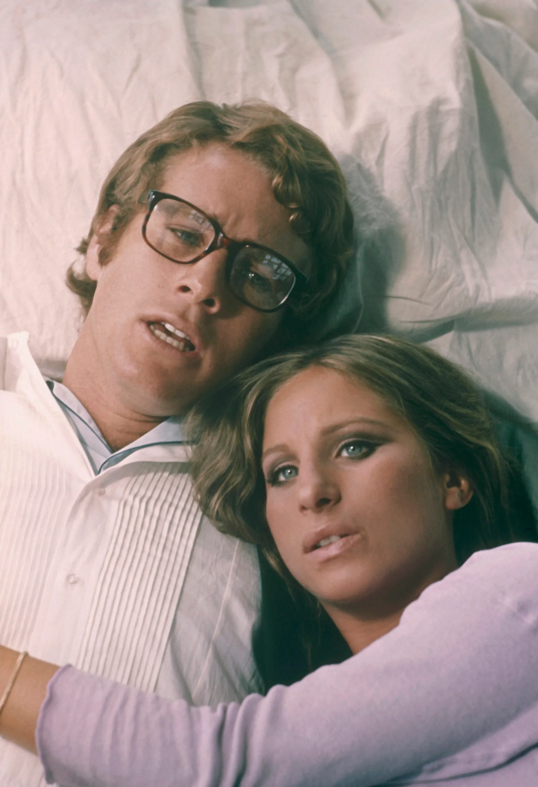 Barbra Streisand Ryan O'Neal embrace 'What's up Doc', 1972. (Photo by Screen Archives/Getty Images)