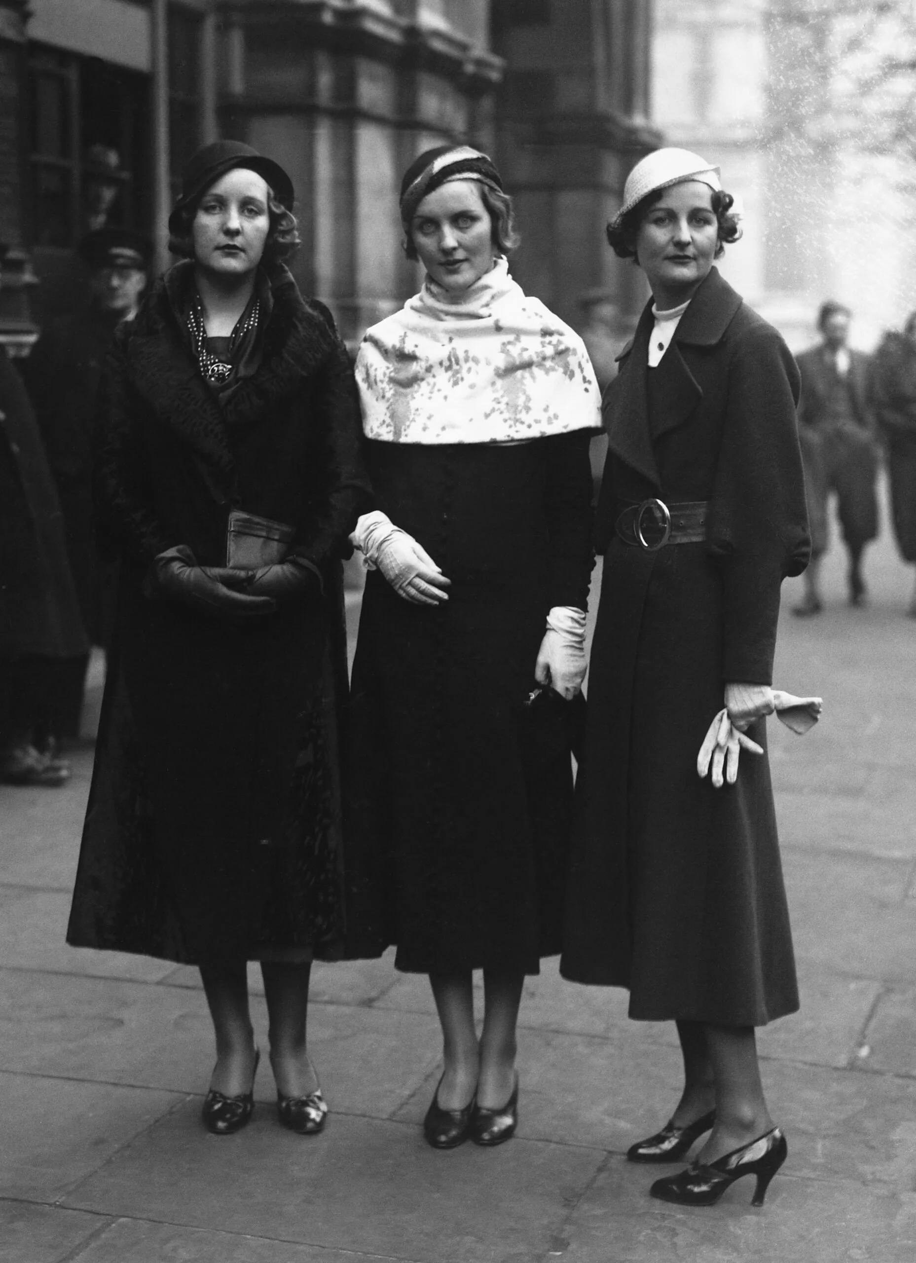 Three of the Mitford sisters as guests at the wedding of Lord Stanley of Aldernay and Lady Audrey Talbot in 1932. English Nazi sympathizer Unity Mitford (l) with her sisters, novelist Nancy Mitford (r) and Diana Mitford (c). (Photo by © Hulton-Deutsch Collection/CORBIS/Corbis via Getty Images)