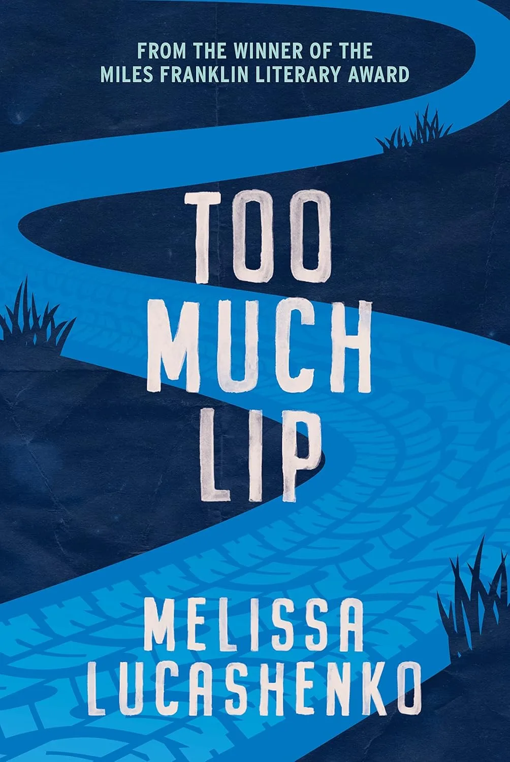 Book cover of Too Much Lip. A blue tire track winds over a dark blue background.