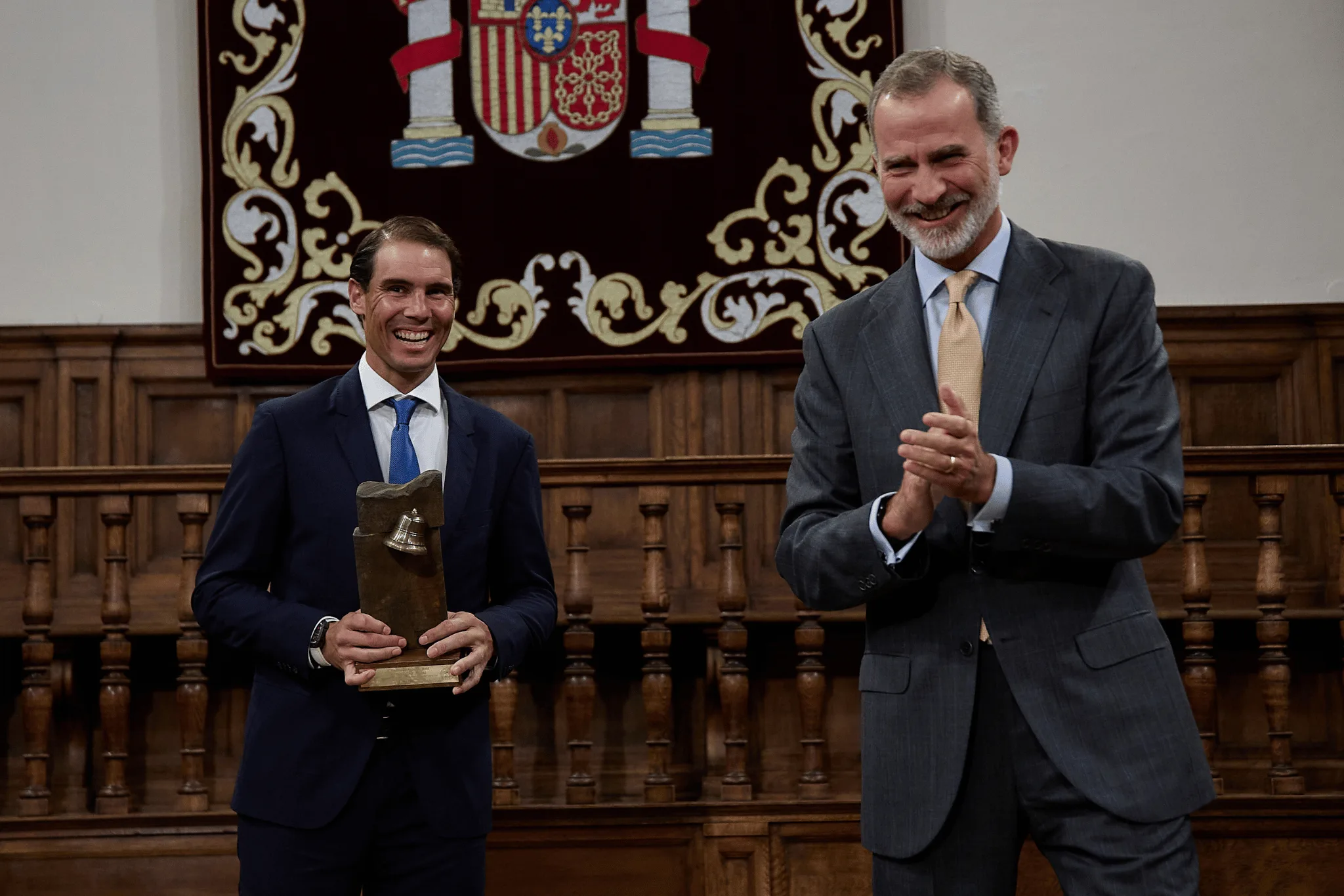 MADRID, SPAIN - SEPTEMBER 20: King Felipe VI (r) presents the 'Camino Real Award' to tennis player Rafael Nadal (l), during its fifth edition, at the auditorium of the University of Alcala, on 20 September, 2022 in Alcala de Henares, Madrid, Spain. The 'Camino Real' award has been granted by the Franklin Institute of the University of Alcala, which recognizes the professional work of Spaniards who in an outstanding and exemplary way project and enhance the positive image of Spain in the United States. The projection of the image of Spain in North America by the tennis player, means his triumph in the US Open (2019), as well as in previous editions of 2010, 2013, 2017 and in other tournaments played in North America. In addition, it is worth mentioning his personal involvement in different social actions from the Rafael Nadal Foundation, which integrates vulnerable minors or young people with intellectual disabilities. (Photo By Jesus Hellin/Europa Press via Getty Images)