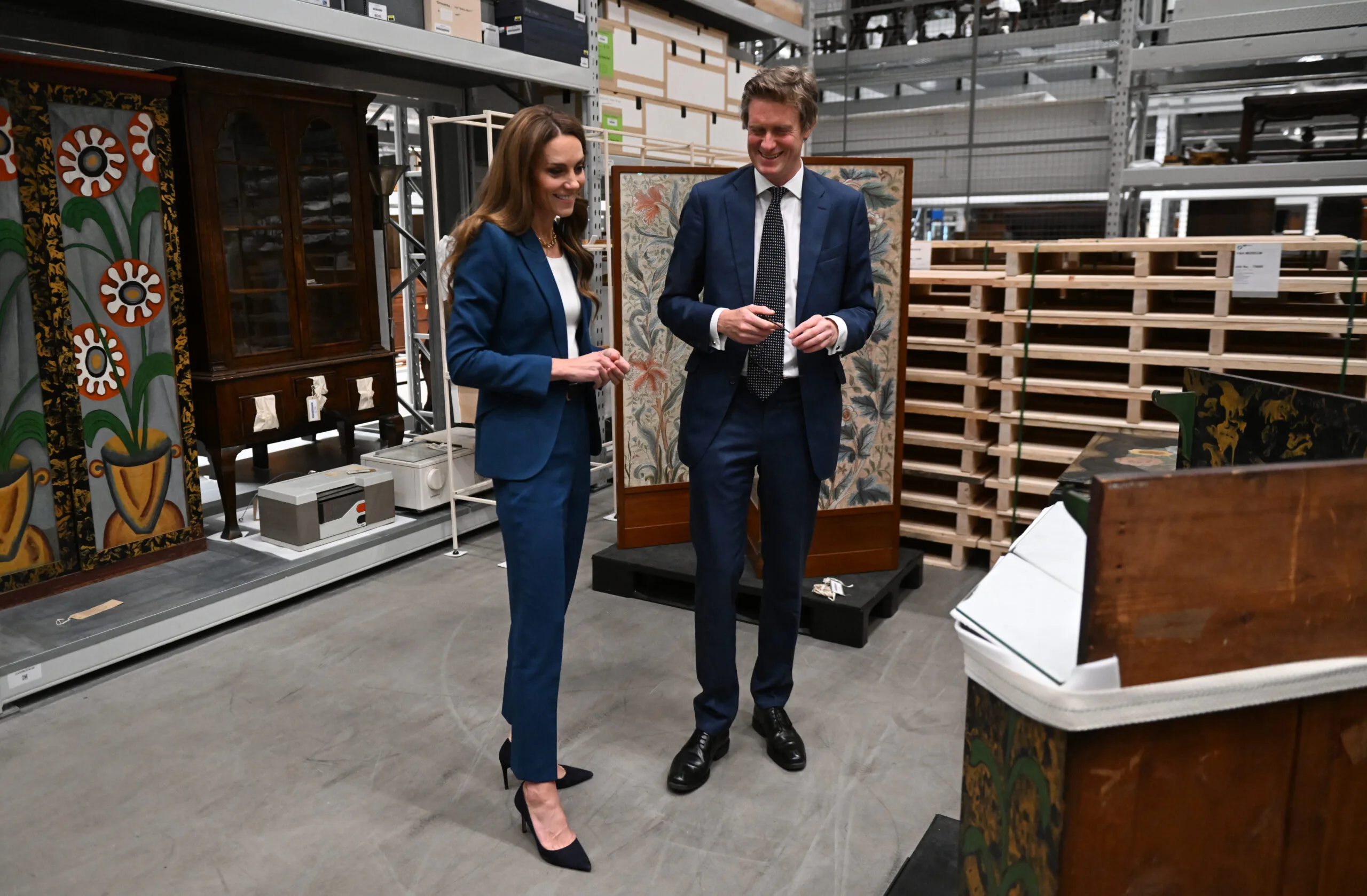LONDON, ENGLAND - JUNE 10: Catherine, Princess of Wales talks with Tristram Hunt Director of The V&A during a visit to the V&A East Storehouse on June 10, 2025 in London, England. Opened on 31 May, V&A East Storehouse reinvents the idea of a museum store and offers free, unprecedented public access to the V&A collections and archives. (Photo by Eddie Mulholland - WPA Pool/Getty Images)