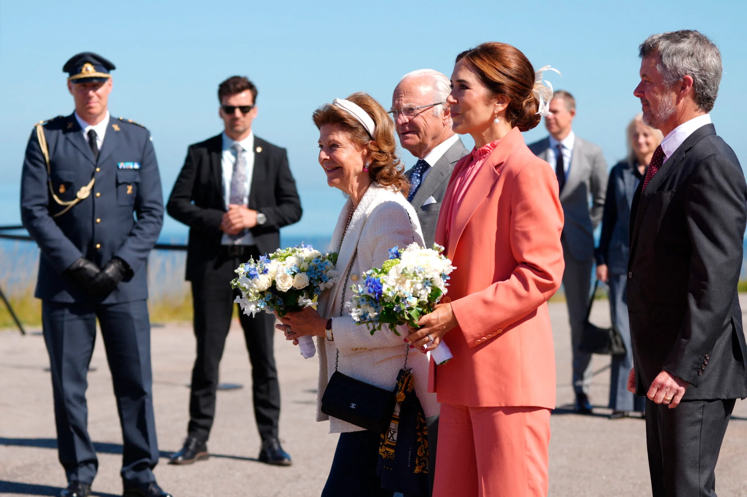 Queen Mary of Denmark (2nd R), Queen Silvia of Sweden (4th R), King Frederik X of Denmark (R) and King Carl XVI Gustaf of Sweden (3rd R) arrive at the island of Perberholm midway at the OEresund Bridge between Denmark and Sweden on July 1, 2025. The OEresund Bridge was inaugurated 25 years ago. (Photo by Liselotte Sabroe / Ritzau Scanpix / AFP) / Denmark OUT (Photo by LISELOTTE SABROE/Ritzau Scanpix/AFP via Getty Images)