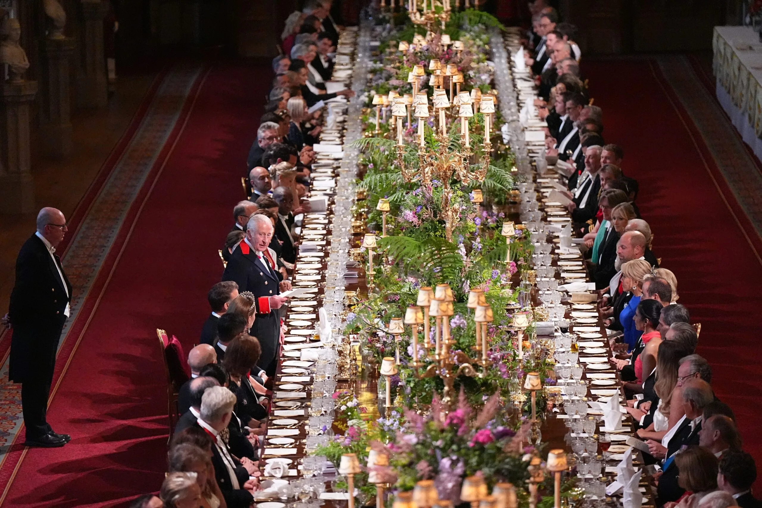 WINDSOR, ENGLAND - JULY 8: Britain's King Charles III delivers a speech during the State Banquet for President of France Emmanuel Macron and his wife Brigitte Macron, at Windsor Castle on July 8, 2025 in Windsor, England. President Emmanuel Macron and Mrs Brigitte Macron visit the UK in the first visit State Visit made by France in 17 years. They are staying at Windsor Castle, hosted by King Charles III and Queen Camilla, and a banquet will be held there in their honour. The Macrons will visit Imperial College, and the President will address Parliament during his stay. (Photo by Aaron Chown - Pool/Getty Images)