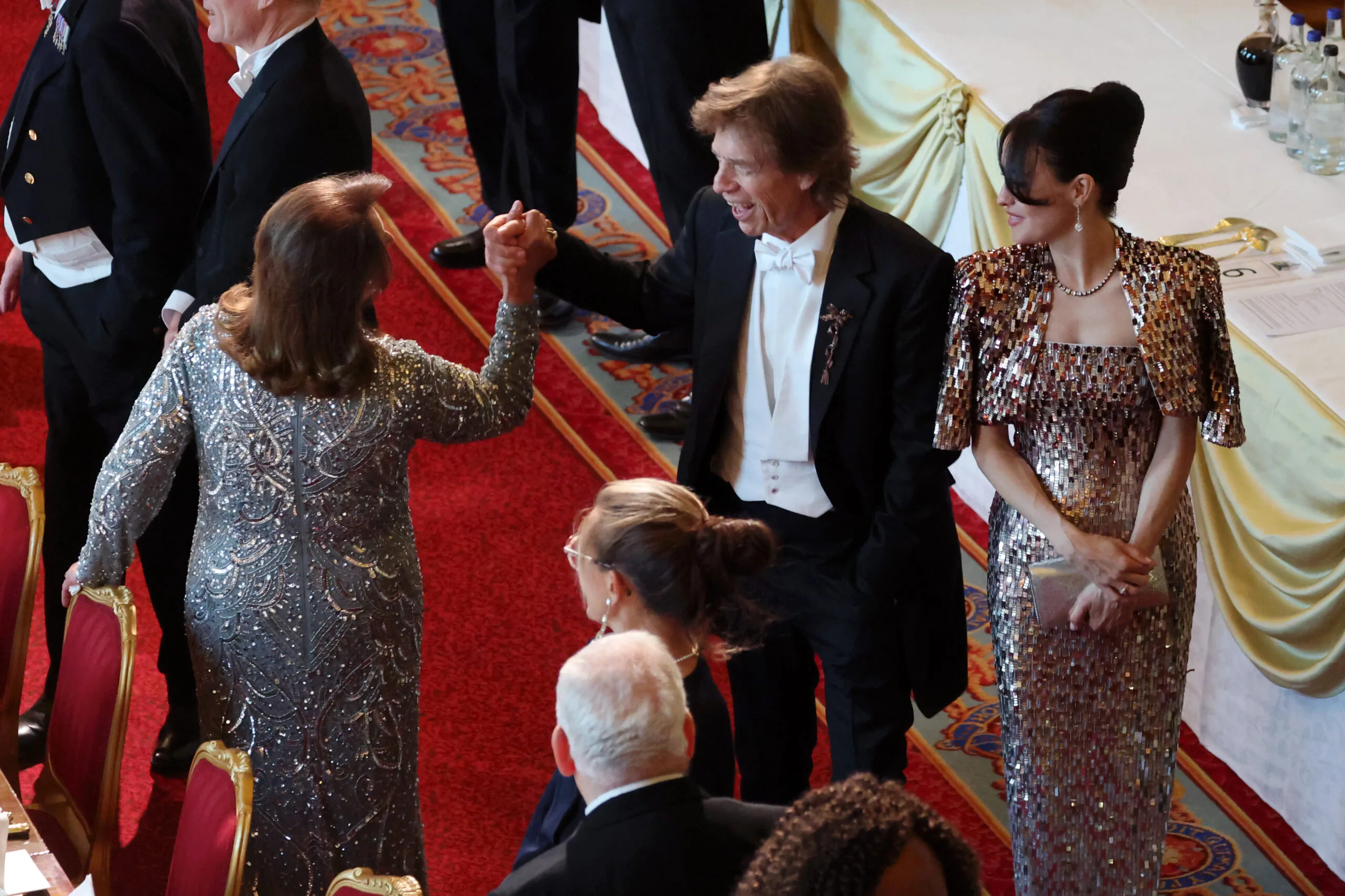 WINDSOR, ENGLAND - JULY 08: Mick Jagger and Melanie Hamrick attend the State Banquet at Windsor Castle on July 08, 2025 in Windsor, England. President Emmanuel Macron and Mrs Brigitte Macron visit the UK in the first visit State Visit made by France in 17 years. They are staying at Windsor Castle, hosted by King Charles III and Queen Camilla, and a banquet will be held there in their honour. The Macrons will visit Imperial College, and the President will address Parliament during his stay. (Photo by Chris Jackson/Getty Images)