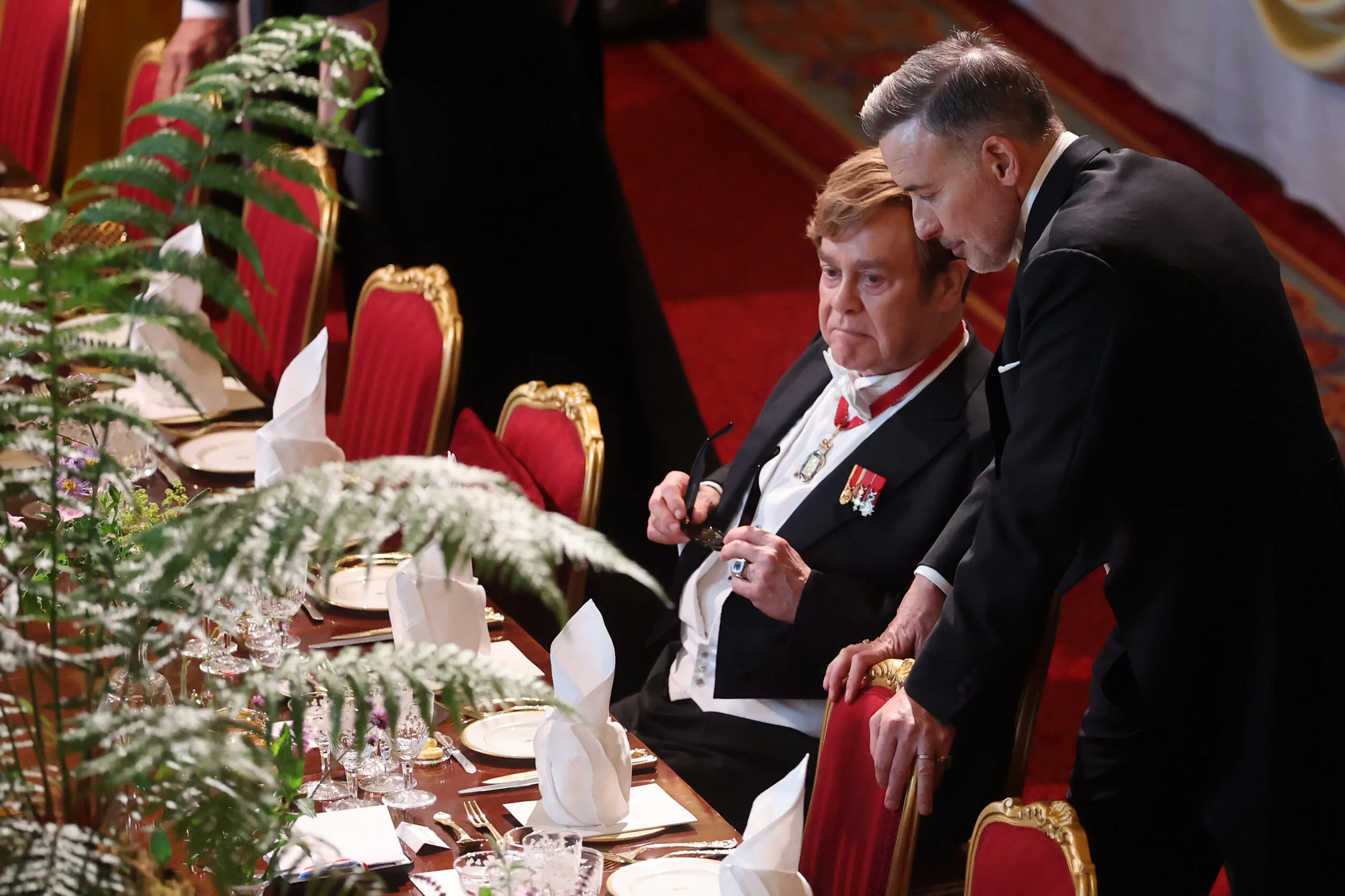 WINDSOR, ENGLAND - JULY 08: Elton John and David Furnish attend the State Banquet at Windsor Castle on July 08, 2025 in Windsor, England. President Emmanuel Macron and Mrs Brigitte Macron visit the UK in the first visit State Visit made by France in 17 years. They are staying at Windsor Castle, hosted by King Charles III and Queen Camilla, and a banquet will be held there in their honour. The Macrons will visit Imperial College, and the President will address Parliament during his stay. (Photo by Chris Jackson/Getty Images)