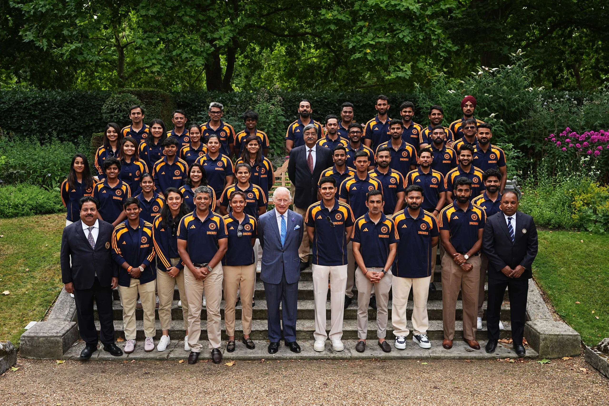 LONDON, ENGLAND - JULY 15: King Charles III poses for a photo with members of the India men's and women's Test cricket teams during an audience in the gardens of Clarence House on July 15, 2025 in London, England. (Photo by Aaron Chown - WPA Pool/Getty Images)