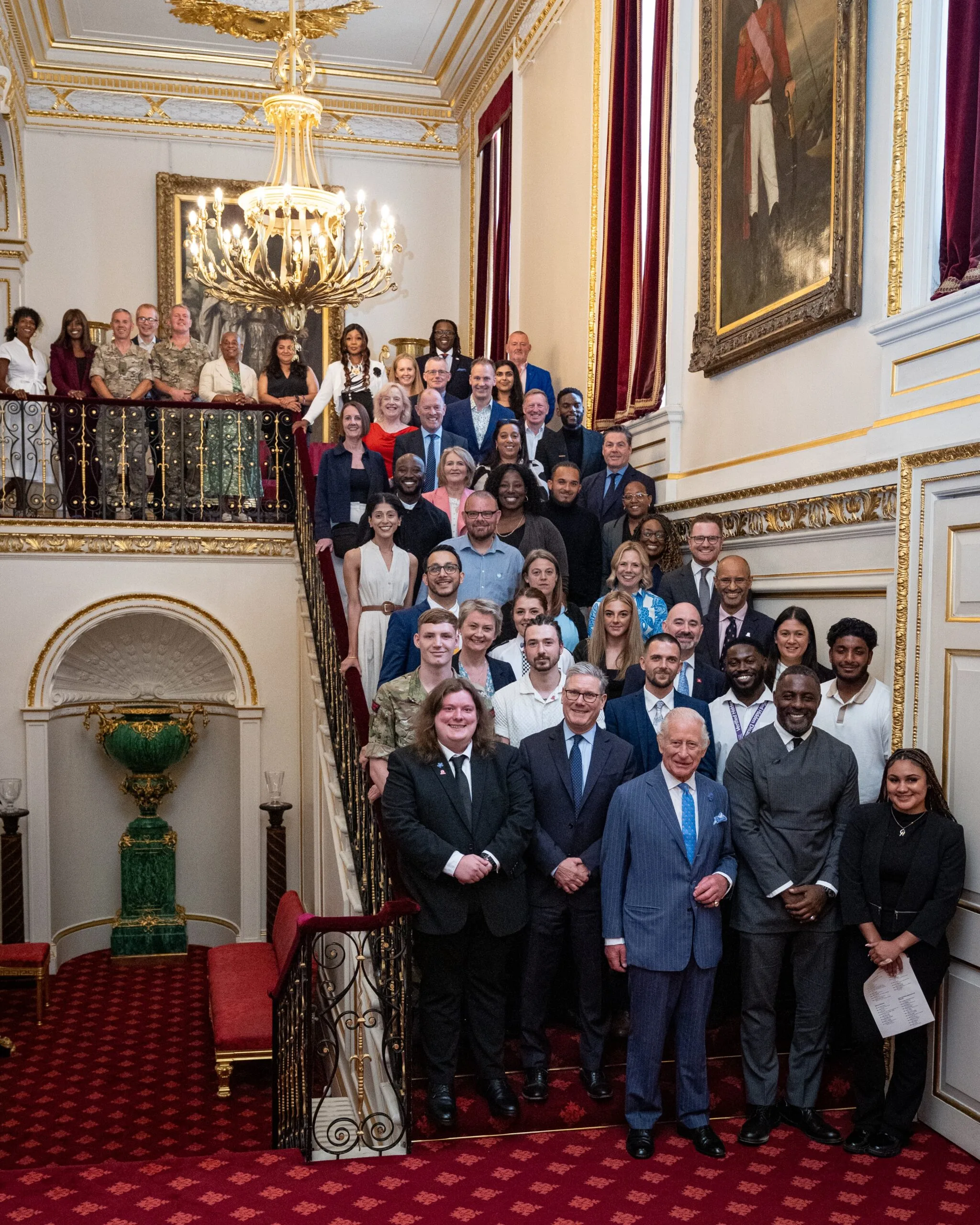 LONDON, ENGLAND - JULY 15: King Charles III (front centre) poses with attendees including Idris Elba (2ndR), founder of the Elba Hope Foundation and an alumnus of the King's Trust, Prime Minister Sir Keir Starmer (2ndL), Home Secretary Yvette Cooper (3rd row L), Culture Secretary Lisa Nandy (3rd row R), at the Youth Opportunity Summit, with young people, youth organisations, government officials, and representatives from the sports, education and arts sectors at St James's Palace on July 15, 2025 in London, England. (Photo by Aaron Chown - WPA Pool/Getty Images)