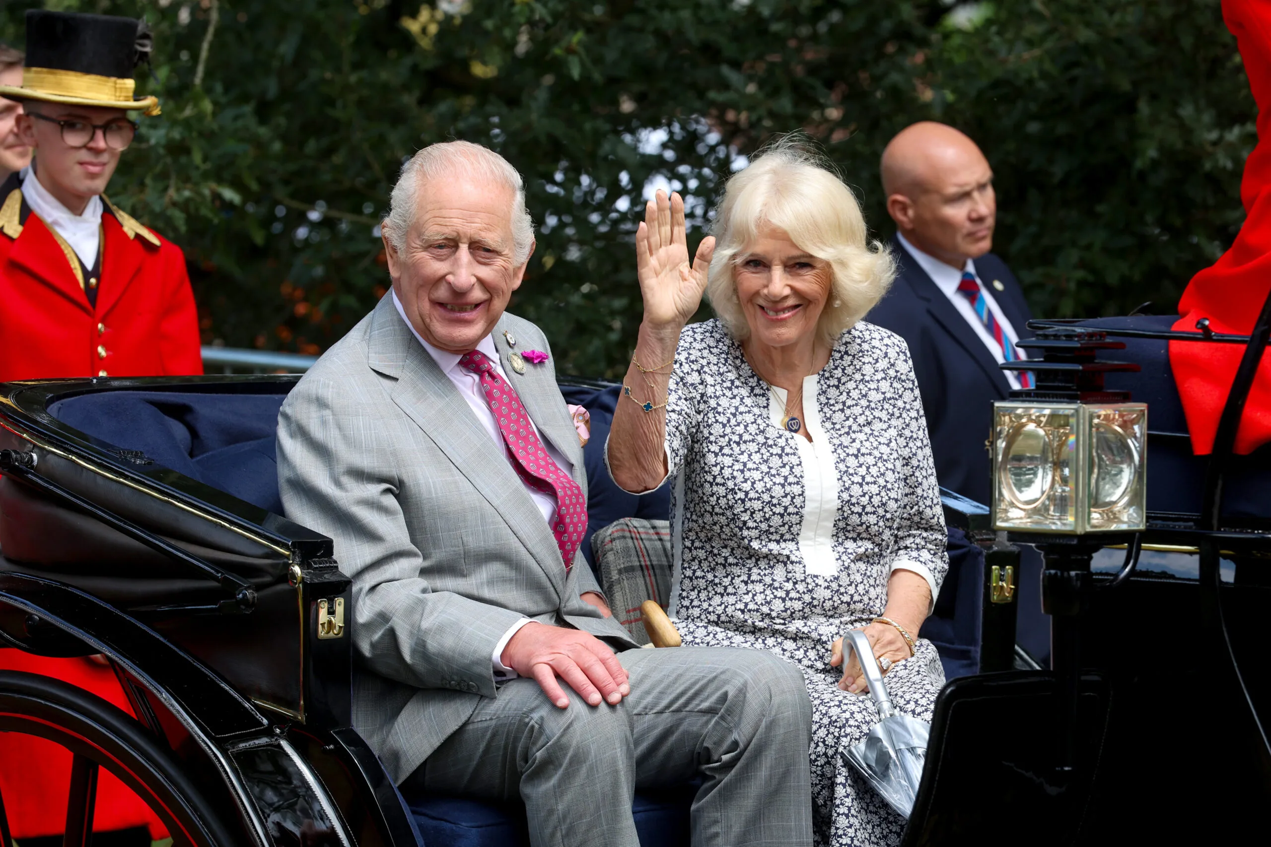 KING'S LYNN, ENGLAND - JULY 23: King Charles III And Queen Camilla in a horse carriage during their visit to the Sandringham Flower Show 2025 at Sandringham House on July 23, 2025 in King's Lynn, England. (Photo by Chris Jackson/Getty Images)