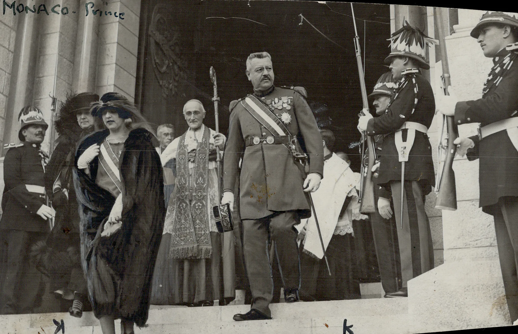 CANADA - JANUARY 01:  Monaco Fete by night. Prince of Monaco's birthday celebrations. The prince of Monaco leaving the cathedral after the birthday service. With him is the heiress-apparent the Duchess de Valentinois.   (Photo by Times Photographer/Toronto Star via Getty Images)