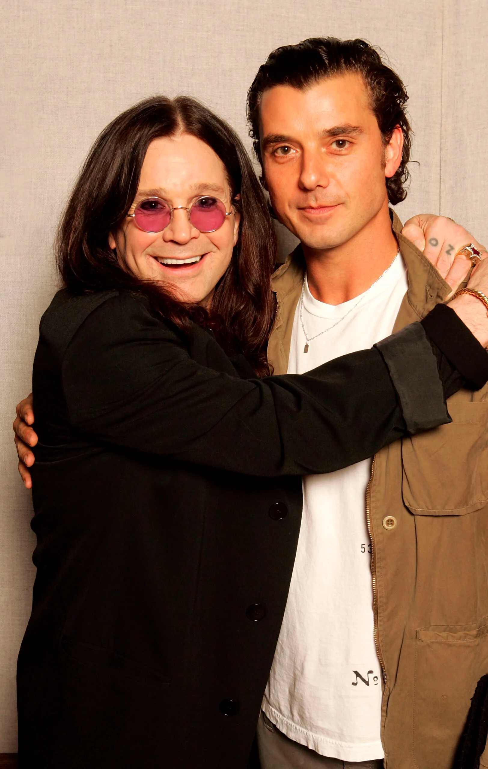 LOS ANGELES, CA - JANUARY 22: Musical artists Ozzy Osbourne (L) and Gavin Rossdale pose for a portrait to promote the Tsunami relief charity single, a cover of the Sir Eric Clapton ballad "Tears In Heaven" , at a Los Angeles studio on January 22, 2005 in Los Angeles, California. Other stars contributing to the single include Sir Elton John, Velvet Revolver, Andrea Bocelli, Robbie Williams, Rod Stewart, Pink, Ozzie and Kelly Osbourne, Gwen Stefani, Gavin Rossdale, Robert Downey Jr., Phil Collins, Josh Groban and Aerosmith's Steve Tyler. The single is an initiative of Sharon Osbourne, and proceeds will go to benefit aid organization Save the Children's operations in tsunami-affected regions. (Photo by Getty Images)