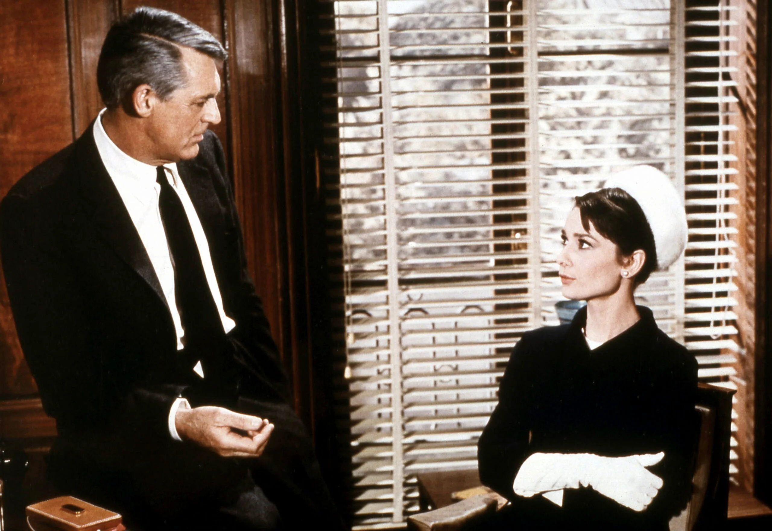 British actors Cary Grant and Audrey Hepburn on the set of Charade, directed and produced by American Stanley Donen. (Photo by Sunset Boulevard/Corbis via Getty Images)