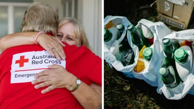 On the left, an Australian Red Cross emergency volunteer in a red shirt is being hugged by a woman with blonde hair, both facing away from the viewer. On the right, several bottles of cleaning products, some green and some yellow, are visible inside a white reusable shopping bag on the ground.