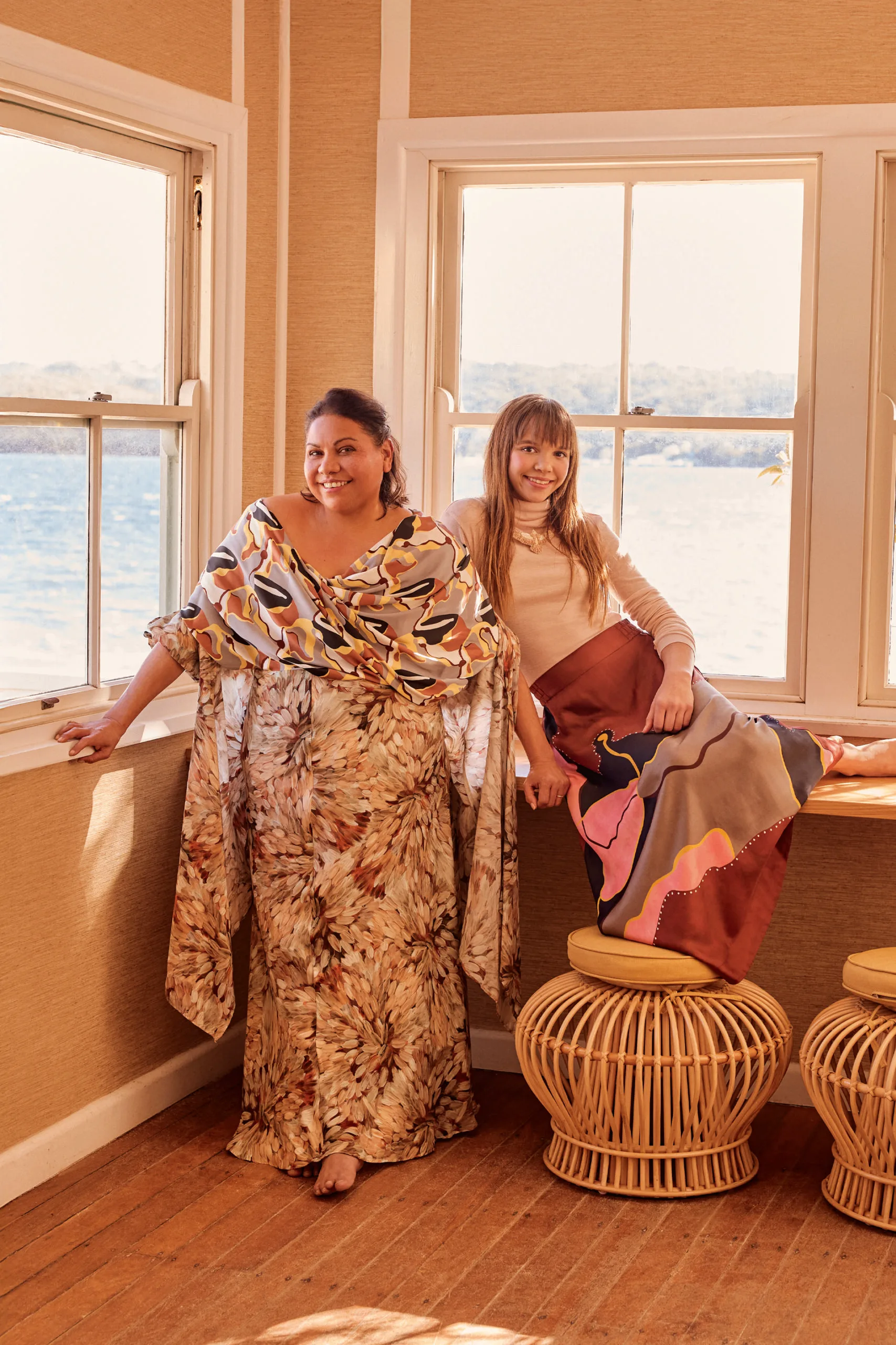 Deborah Mailman and Lily Whiteley by a window