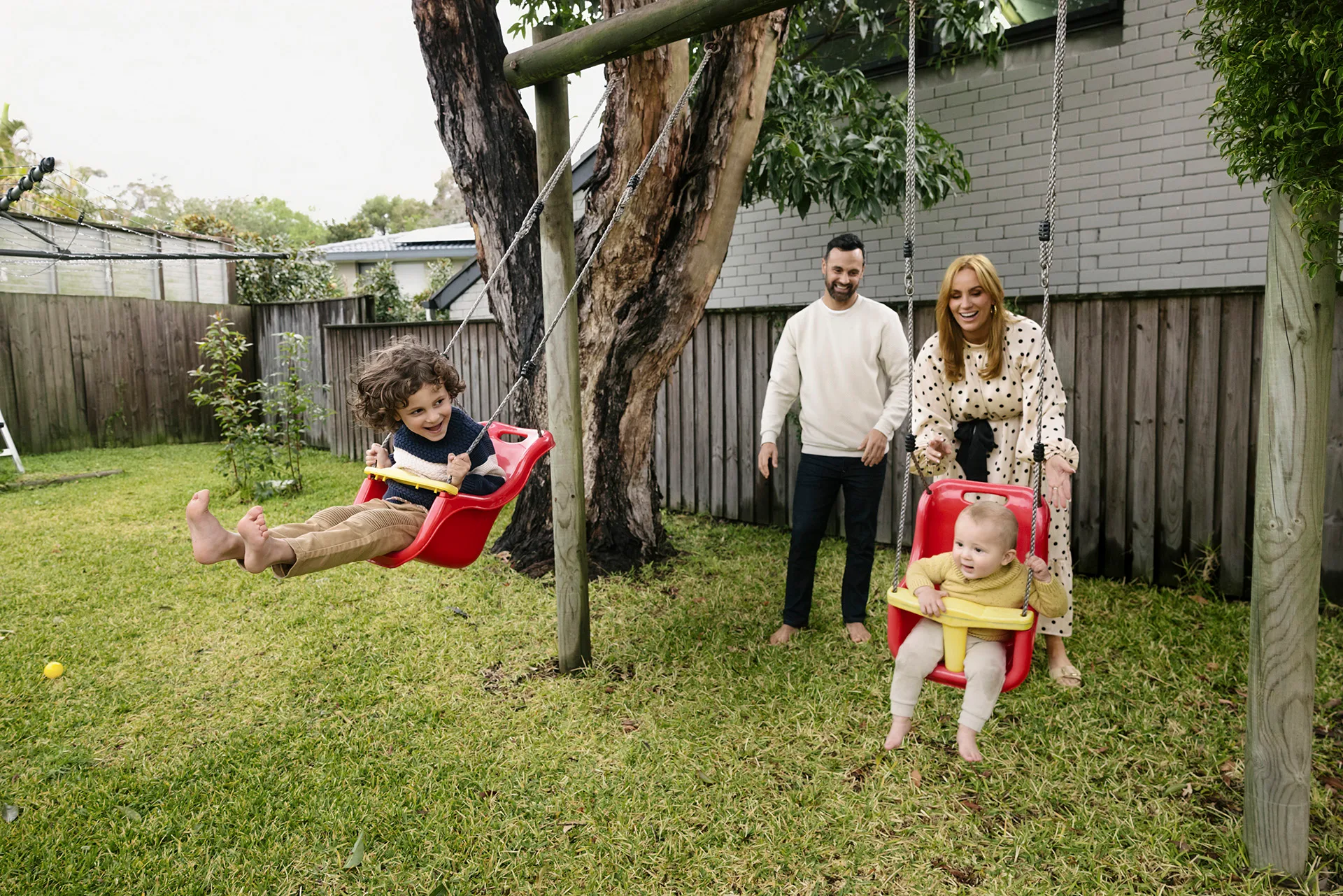 Jules Robinson pictured at home on Sydney's northern beaches with kids Ollie 4 and Carter 1 and husband Cam . Photo by Toby Zerna/The Photo Pitch