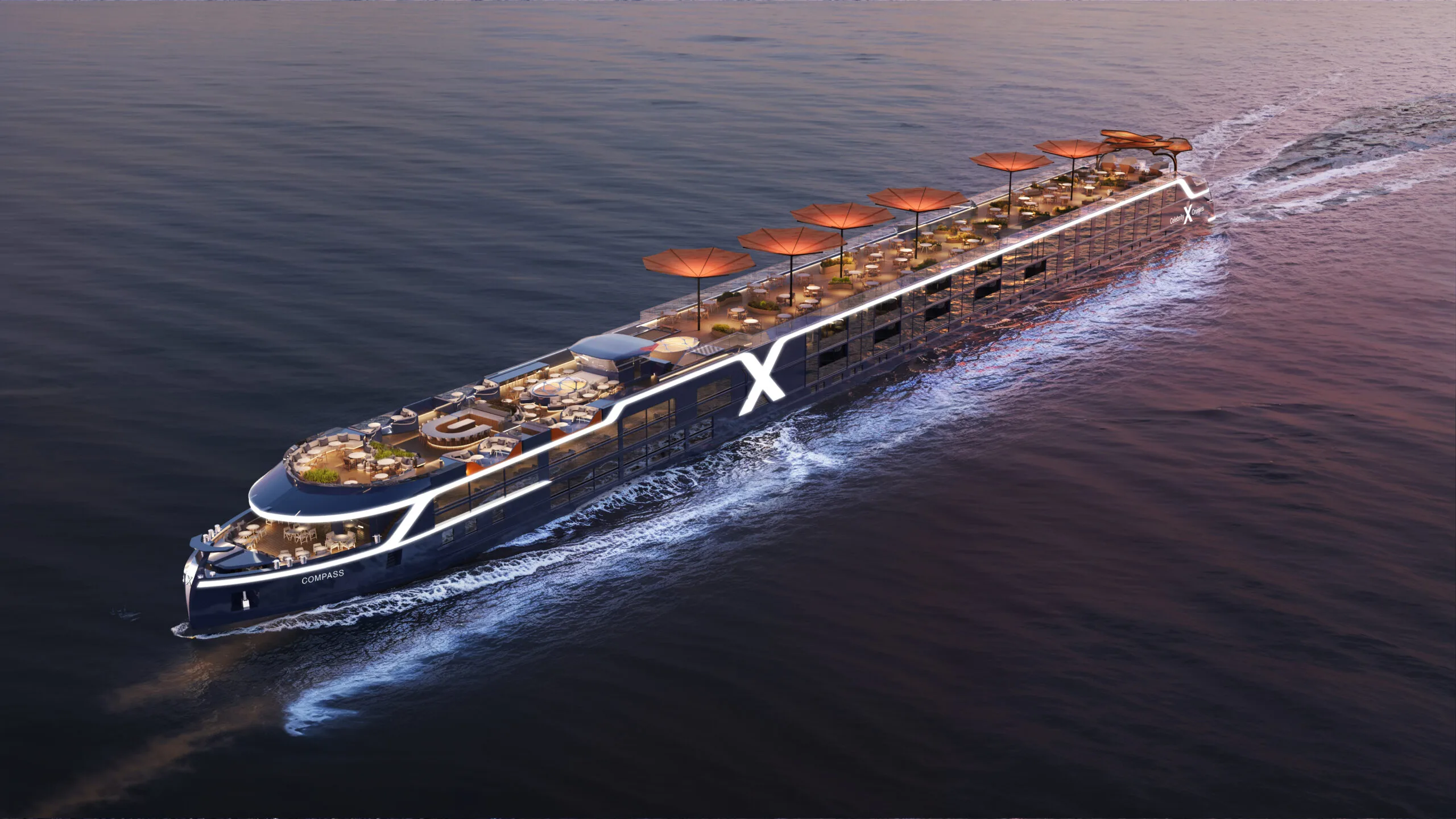 A sleek blue river ship with many rooftop open areas, some shaded with orange umbrellas.