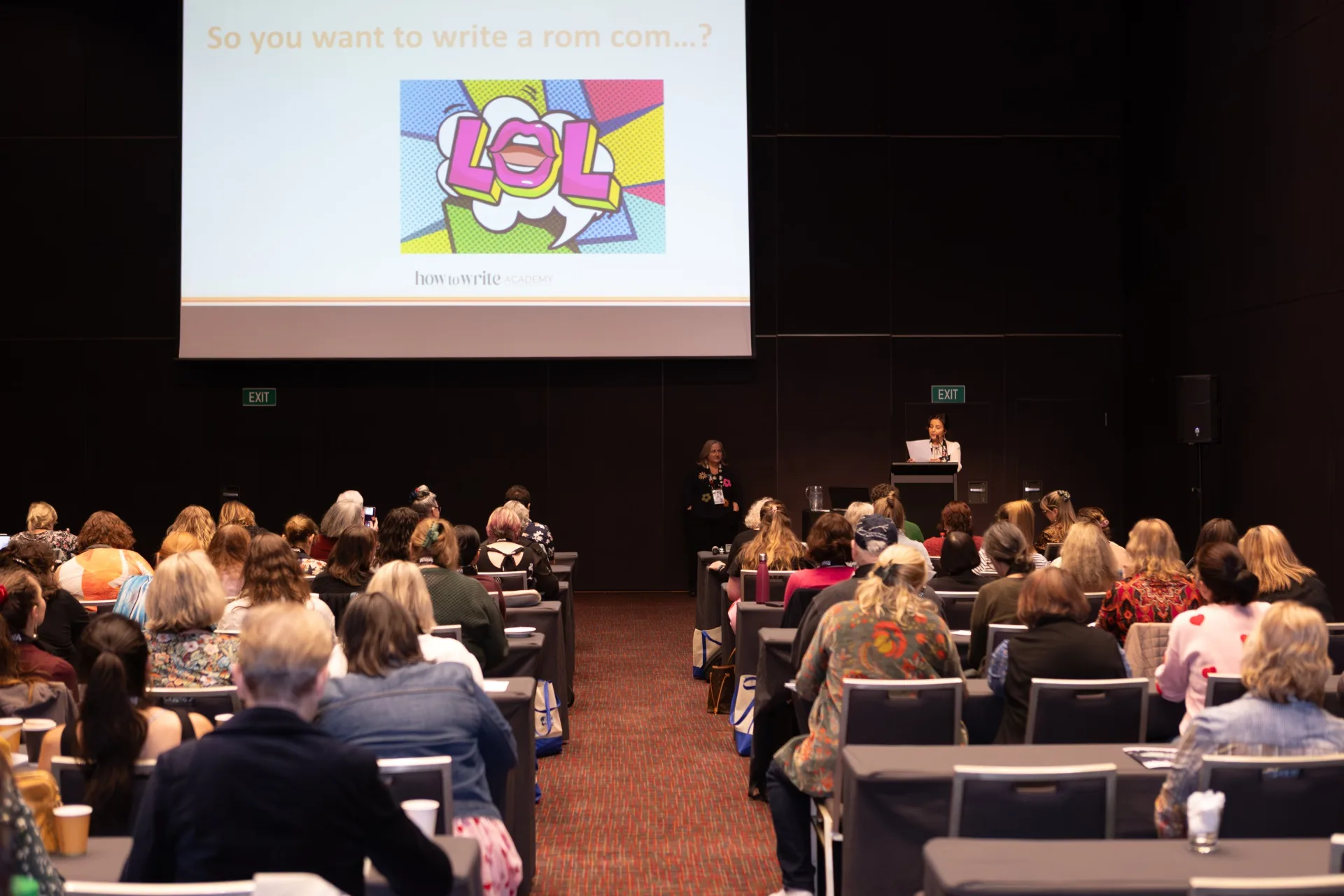 Group of people sitting in a lecture room at the romance writers of Australia conference.